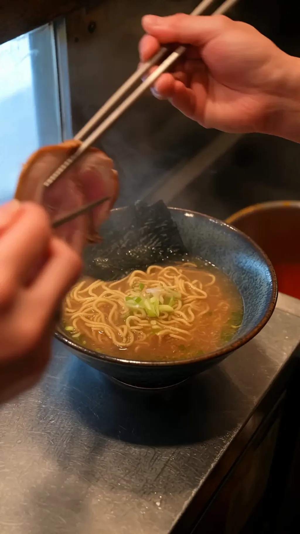 Wan 3.0: A chef finishes a steaming bowl of ramen.